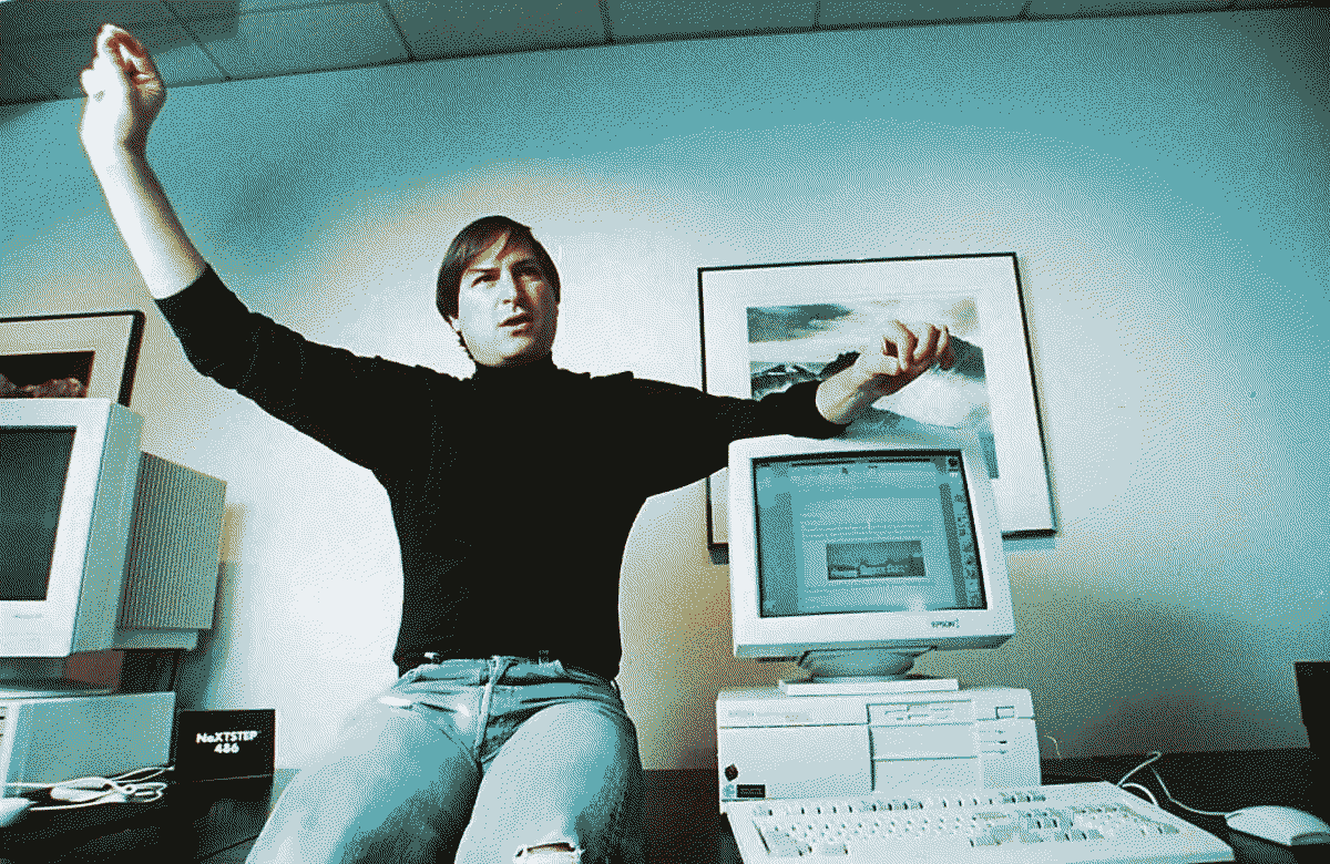 a dithered image of Steve Jobs probably giving a talk